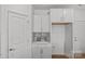 Walk-in pantry with white cabinets and quartz countertop at 15926 Parkside Crossing Dr # 322, Charlotte, NC 28273
