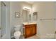 Bathroom with neutral walls, tiled flooring, a single vanity, and a toilet at 1678 Onyx Rdg, Fort Mill, SC 29708