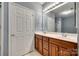 Bathroom with dual sinks, a large mirror, and ample cabinet space at 1678 Onyx Rdg, Fort Mill, SC 29708