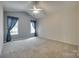 Spacious bedroom with vaulted ceiling, ceiling fan, and lots of natural light at 1678 Onyx Rdg, Fort Mill, SC 29708