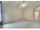 Large bedroom with vaulted ceiling and plush carpet at 1678 Onyx Rdg, Fort Mill, SC 29708