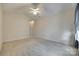 Spacious bedroom featuring neutral colors, a ceiling fan, and natural light at 1678 Onyx Rdg, Fort Mill, SC 29708