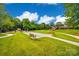 Community lawn bowling area with benches and scenic landscaping for residents' recreational use at 1678 Onyx Rdg, Fort Mill, SC 29708