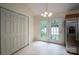 Bright breakfast nook with French doors to backyard adjacent to the kitchen at 210 Park St, Bessemer City, NC 28016