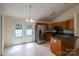 Eat-in kitchen with stainless steel appliances and access to a bright breakfast nook at 210 Park St, Bessemer City, NC 28016