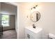 Modern bathroom boasts updated vanity and fixtures at 210 W 15Th St, Newton, NC 28658