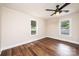Bedroom features hardwood floors and bright windows at 210 W 15Th St, Newton, NC 28658