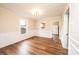 Dining room featuring chair railing, hardwood floors and neutral color palette at 210 W 15Th St, Newton, NC 28658