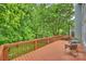 Spacious deck with lush green backyard views, great for entertaining or relaxing at 2100 Sablewood Dr, Charlotte, NC 28205
