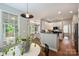 Modern kitchen with stainless steel appliances and an open layout to the dining area at 2100 Sablewood Dr, Charlotte, NC 28205