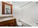 Bathroom featuring a vanity, toilet, and shower-tub combination at 2109 Brewton Dr, Charlotte, NC 28206