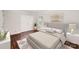 Bright bedroom featuring hardwood floors, double closets, and neutral paint at 2109 Brewton Dr, Charlotte, NC 28206