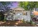 Charming single-story home with a covered porch and white brick facade at 2109 Brewton Dr, Charlotte, NC 28206
