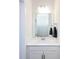 Clean bathroom with a large mirror, white vanity, and chrome fixtures at 2141 Bexar Trl, Matthews, NC 28105