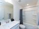 Well-lit bathroom with a shower-tub combo and sleek vanity at 2141 Bexar Trl, Matthews, NC 28105