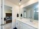 Bright bathroom with double sink vanity, large mirror, and walk-in shower at 2141 Bexar Trl, Matthews, NC 28105