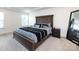 Spacious main bedroom with a king-sized bed and neutral-toned decor at 2141 Bexar Trl, Matthews, NC 28105