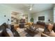 Open-concept living room flowing into the dining area and kitchen at 21614 Colina Dr, Cornelius, NC 28031