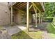 Brick home backyard featuring patio and outdoor landscaping at 2346 Donnington Nw Ln, Concord, NC 28027