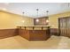 View of the basement bar area with carpet and overhead lighting at 2346 Donnington Nw Ln, Concord, NC 28027