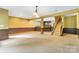 Partially finished basement with carpet and wood paneling at 2346 Donnington Nw Ln, Concord, NC 28027