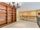 Second bonus room featuring built-in bookshelves and balcony access at 2346 Donnington Nw Ln, Concord, NC 28027