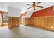 Large bonus room with knotty pine wainscoting and dormer windows at 2346 Donnington Nw Ln, Concord, NC 28027
