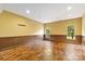 A large bonus room with two windows, tile floors and neutral paint colors at 2346 Donnington Nw Ln, Concord, NC 28027