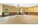Open bonus room featuring neutral carpet and ample windows at 2346 Donnington Nw Ln, Concord, NC 28027