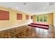 Bonus room with hardwood floors and elevated carpeted platform at 2346 Donnington Nw Ln, Concord, NC 28027