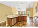 Well-appointed kitchen with wooden cabinets, granite countertops, and modern stainless steel appliances at 2346 Donnington Nw Ln, Concord, NC 28027