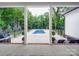 Secluded backyard pool and patio area, perfect for outdoor entertaining and relaxation at 2608 Henry Baucom Rd, Monroe, NC 28110