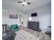 Upstairs bedroom with decor, painted in neutral colors, and filled with light at 2608 Henry Baucom Rd, Monroe, NC 28110