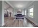 Open-concept dining room with modern light fixture and kitchen view, perfect for Gathering gatherings at 2608 Henry Baucom Rd, Monroe, NC 28110