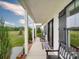 Charming front porch with rocking chairs, creating an inviting entrance and providing ample space to relax at 2608 Henry Baucom Rd, Monroe, NC 28110