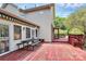 Spacious outdoor deck offers great entertainment potential with shaded seating and backyard views at 261 Melrose Sw Dr, Concord, NC 28025