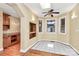 Bright breakfast nook with tile floor and a ceiling fan at 261 Melrose Sw Dr, Concord, NC 28025