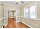 Bright office with hardwood floors, French doors, and natural light, perfect for a workspace at 261 Melrose Sw Dr, Concord, NC 28025
