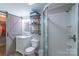 Updated bathroom featuring walk-in shower, custom barn door, and modern fixtures at 28782 Canton Rd # A, Albemarle, NC 28001