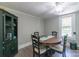 Cozy dining room featuring hardwood floors, bright window, and classic table set at 28782 Canton Rd # A, Albemarle, NC 28001