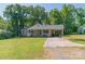 Charming single-story home with a welcoming front porch and well-maintained lawn at 28782 Canton Rd # A, Albemarle, NC 28001
