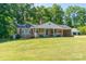 Charming brick home with a well-manicured lawn and inviting front porch at 28782 Canton Rd # A, Albemarle, NC 28001