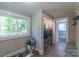 Hallway area leading to laundry room with modern machines at 28782 Canton Rd # A, Albemarle, NC 28001