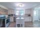 Charming kitchen with stainless steel appliances, center island, and ample cabinet space at 28782 Canton Rd # A, Albemarle, NC 28001