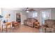 Comfortable living room with laminate flooring, ceiling fan, and neutral paint at 28782 Canton Rd # A, Albemarle, NC 28001