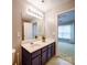 Charming bathroom vanity and ensuite access to bedroom at 3055 Golden Dale Ln # 104, Charlotte, NC 28262