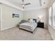 Inviting bedroom with a ceiling fan, large windows, and plush carpeting creating a cozy retreat at 3135 Everly Enclave Way, Charlotte, NC 28210