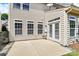A roomy back patio with double doors to the home at 3251 Park South Station Blvd, Charlotte, NC 28210