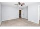Bedroom featuring neutral walls, carpet flooring, and doors to the hall and closet at 3251 Park South Station Blvd, Charlotte, NC 28210