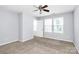 Bedroom with carpet, light walls, bright windows and a ceiling fan at 3251 Park South Station Blvd, Charlotte, NC 28210